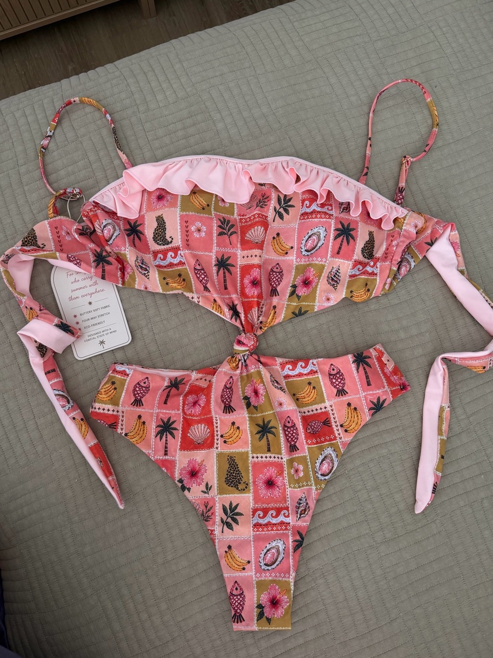 Pink Tropical Print One-Piece Swimsuit with Ruffle and Tie Detail